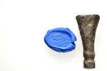 ANCIENT ROMAN BRONZE STAMP SEAL.(1st-2nd century).Ae.

Weight : 2.8 gr
Diameter : 14 mm