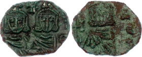 Byzantium Follis 741 - 775 AD
SB 1569; Copper 2.07 g.; Constantine V Copronymus, with Leo IV and Leo III; Obv: Constantine and Leo IV standing facing...
