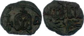 Byzantium Follis 741 - 775 AD
SB 1569; Copper 1.78 g.; Constantine V Copronymus, with Leo IV and Leo III; Obv: Constantine and Leo IV standing facing...