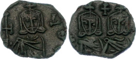 Byzantium Follis 741 - 775 AD
SB 1569; Copper 1.96 g.; Constantine V Copronymus, with Leo IV and Leo III; Obv: Constantine and Leo IV standing facing...