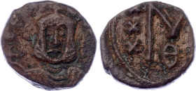 Byzantium Follis 830 - 842 AD
SB 1681; Copper 3.22 g.; Theophilus; Mint Syracuse; Obv: Crowned facing bust, wearing chlamys, holding globus cruciger....
