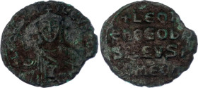Byzantium Follis 886 - 912 AD
SB 1729; Copper 3.82 g.; Leo VI; Obv: Crowned facing bust, wearing chlamys and holding akakia. Rev: +LOh/hθObA/SILVSR/O...