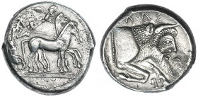 SICILIA. Gela. Tetradracma (480-470 a.C.). A/ Cuádriga a der. conducida por auriga, encima Nike. R/ Prótomo de toro androcéfalo, encima: GELAS. AR 15,...