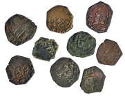 9 monedas de 8 maravedís. (1661). Sevilla (8) y Valladolid. Dos con fecha y dos falsos de época. RC/BC+.