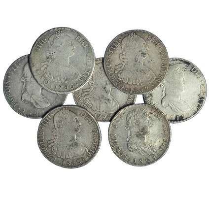 7 monedas de 8 reales. Carlos IV (4), Fernando VII (3). Guadalajara, México (3),...