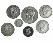 7 monedas: 10 centavos de peso, 1885; 20 centavos de peso, 1884; 50 centavos de peso , 1868, 1881, 1882 y 1885; peso, 1897. Manila. MBC-/MBC+.