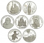 VATICANO. Juan Pablo II. 8 monedas: 2000 liras, 2000 y 2001; 5000 liras, 2001; 5 euro, 2002, 2003 y 2004; 10 euro, 2002. Prueba.