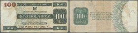Poland: Bon Towarowy 100 Dolarow 1979, P.FX46 in well worn condition, tears at upper and lower margin, folds and stains. Condition: VG