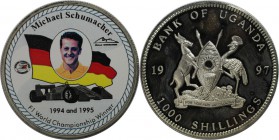 Weltmünzen und Medaillen, Uganda. Michael Schumacher. 1000 Schillings 1997. Polierte Platte, mit Farbaufkleber