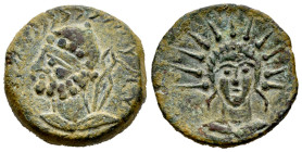 Malaka. Unit. 200-20 BC. Malaga. (Abh-1730). (Acip-790). Anv.: Head of Vulcan left, tongs and punic legend behind. Rev.: Head of Helios facing. Ae. 10...