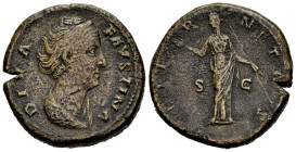 Diva Faustina. Sestertius. 141 AD. Rome. (Ric-1102). Anv.: DIVA FAVSTINA, draped bust right . Rev.: AETERNITAS, Juno standing left, raising hand and h...