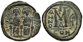 Justinus II with Sophia. 40 Nummi. RY 6 = 570/1 AD. Constantinople. (Doc-I 29d). (Mib-II 43d). (Sear-360). Ae. 14,59 g. Almost VF. Est...50,00. 

Sp...