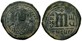 Mauricius Tiberius. Follis. 597-598 AD. Antioch. (Sear-533). (Doc-168b). Anv.: Facing bust of Maurice, wearing crown with pendilia and consular robes,...