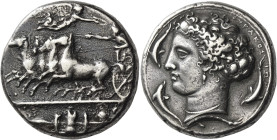 Syracuse
Decadrachm signed by Kimon circa 404-400, AR 42.82 g. Fast quadriga driven l. by charioteer, holding reins and kentron; in field above, Nike...