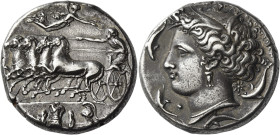 Syracuse
Decadrachm signed work by Euainetos circa 400, AR 43.28 g. Fast quadriga driven l. by charioteer, holding reins and kentron; above, Nike fly...