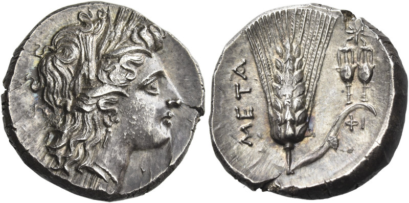 Metapontum
Nomos circa 290-280, AR 7.93 g. Head of Demeter r., wearing barley w...