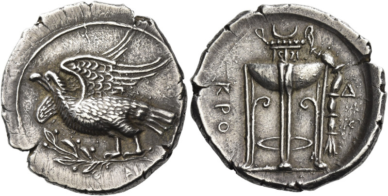 Croton
Nomos circa 350–300, AR 7.94 g. Eagle standing l., with spread wings, on...