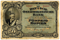 DEUTSCHE KOLONIEN, Deutsch-Ost-Afrika, 1905-1917, 50 Rupien 15.06.1905, Friedensausgabe. KN 4-stellig, VS 2x rot, Rs.2x schwarz.
IV+
Ros.902c; Grab....