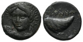 Aeolis, Gyrneion. Circa 4th century BC. AE (11mm, 4.05g). Laureate head of Apollo facing slightly left / PNHΩN. Mussel shell. SNG von Aulock 7689.