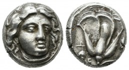 Caria. Rhodes, (Mid-late 4th century BC). AR Didrachm (16mm, 6.89g). Head of Helios facing slightly right / ΡΟΔΙΩΝ. Rose with bud to right; grape bunc...