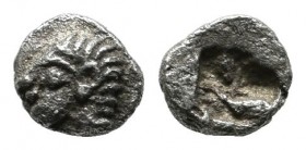 Ionia, Kolophon. Circa 525-500 BC. AR Tetartemorion (4mm, 0.19g). Archaic head of Apollo left / Incuse square punch. SNG Kayhan 343; SNG von Aulock 18...