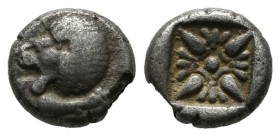 Ionia, Miletos. Late 6th-early 5th century BC. AR Obol – Hemihekte (8mm, 0.76g). Forepart of lion right, head reverted. / Stellate pattern within incu...