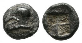 Ionia. Uncertain mint. Circa 600-550 BC. AR Obol (7mm, 0.69g). Corinthian helmet left / Quadripartite incuse square with alternating raised and sunken...