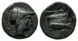 Kings of Macedon. Demetrios I Poliorketes. 306-283 BC. AE (13mm, 2.36g). Uncertain mint (possibly in Caria), 306-283 BC. Head of Athena right in crest...