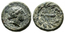 Lydia, Sardes. Circa 133 BC-AD 14. AE (15mm, 4.47g). Laureate head of Apollo to right / ΣAPΔIANΩN Club; all within laurel wreath; to right, monogram. ...