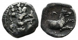 Lykaonia, Laranda. AR Obol (10mm, 0.60g). Circa 324/3 BC. Baaltars seated left, holding grain ear, grape bunch, and scepter / Forepart of wolf right; ...