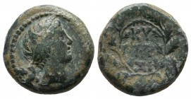 Mysia, Kyzikos. 2nd-1st century BC. AE (18mm, 5.90g). Head of Kore Soreira right / Legend and monogram within oak-wreath. SNG BnF 462.