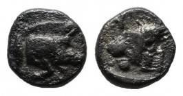 Mysia, Kyzikos. ca.450-400 BC. AR Hemiobol (5mm, 0.28g). Forepart of boar right; to left, tunny upward. / Head of lion left; retrograde K to upper lef...