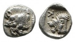 Mysia, Kyzikos. Circa 450-400 BC. AR Hemiobol (6mm, 0.42g). Forepart of boar left; to right, tunny upward / Head of roaring lion left; retrograde K to...