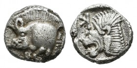 Mysia, Kyzikos. Circa 480 BC. AR Obol (8mm, 0.82g). Forepart of boar left with tall mane and dotted end point, E (retrograde) on shoulder; to right, t...