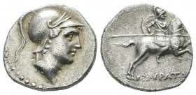 Phrygia, Kibyra. Circa 166-84 BC. AR Drachm (17mm, 3.64g). Young male head right, wearing crested helmet / Helmeted and cuirassed horseman galloping r...