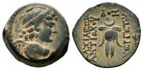Seleukid Kingdom. Antiochos VII Euergetes. 138-129 BC. AE (17mm, 5.47g). Antioch mint, struck 129 BC. Winged bust of Eros right, wreathed with myrtle ...