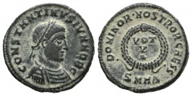 Constantine II (Caesar, 317-337). AE Follis (18mm, 2.69g). Heraclea, 324. Laureate, draped and cuirassed bust right / VOT V in laurel wreath; *//SMH?....