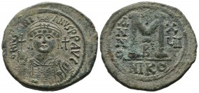 Justinian I. 527-565. AE Follis (33mm, 21.28g). Nicomedia mint, 2nd officina. Dated RY 16 (542/3). Helmeted and cuirassed facing bust, holding globus ...