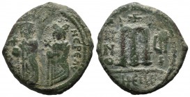 Phocas, with Leontia. AD 602-610. Theoupolis (Antioch). AE Follis (27mm, 10.14g). ON FOCA NEP ЄAV, Phocas and Leontia standing facing, the emperor hol...