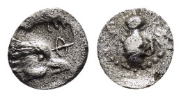 IONIA.Ephesos.(Circa 5th Century BC).Hemiobol. 

Weight : 0.22 gr
Diameter : 6 mm