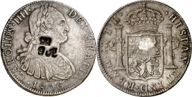 Belice. Honduras Británicas. (1810-1818). Contramarca falsa GR bajo corona (De Mey 372) sobre 8 reales de Carlos IV, México 1806 TH. MBC+.