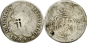 Cuba. (1841). Contramarca de Vique (Cuba) (De Mey 481) sobre 2 reales de Carlos III falsos de época en metal blanco, con fecha 1784, ceca I y ensayado...