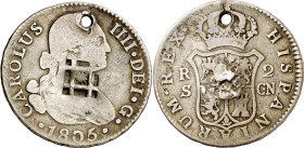 Cuba. (1841). Contramarca de Vique (Cuba) (De Mey 481), sobre 2 reales de Carlos IV, Sevilla 1805 CN (Kr. 3). Perforación. 5,73 g. Contramarca MBC+, p...