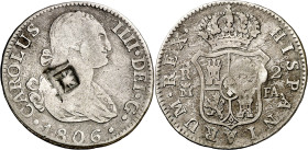 Cuba. (1841). Contramarca de Vique (Cuba) (De Mey 481) sobre 2 reales de Carlos IV, Madrid 1806 FA (Kr. 2). 5,60 g. Contramarca MBC+, pieza base MBC-.