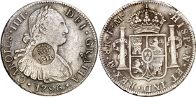 Filipinas. (1834-1837). Contramarca falsa , sobre 8 reales de Carlos IV, México 1796 FM. Rayitas en anverso. 26,58 g. MBC-.