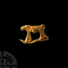 Egyptian Gold Baboon Amulet
New Kingdom-Roman Period, 1550 B.C.-323 A.D. A gold amulet formed in the round as a baboon, sacred to the god Thoth, walk...