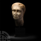 Roman Marble Statue Head
1st century B.C.-1st century A.D. A characteristic, rugged portrait with hairstyle typical of princes of the period, or of t...