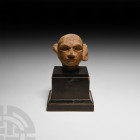 Western Asiatic Head of a Nobleman
2nd millennium B.C. A composition head depicting a nobleman with stylised features, with almond-shaped eyes beneat...