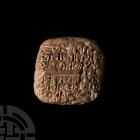 AKKADIAN CUNEIFORM TABLET
CIRCA 1700 B.C. An Akkadian letter from the Old-Babylonian period, a sub-square ceramic tablet with rounded corners bearing...