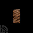 OLD BABYLONIAN CUNEIFORM TABLET, A WAR LETTER FROM ISIK-MALIK TO KUBBURUM.
EARLY 2ND MILLENNIUM B.C. A ceramic tablet bearing a cuneiform letter, wit...